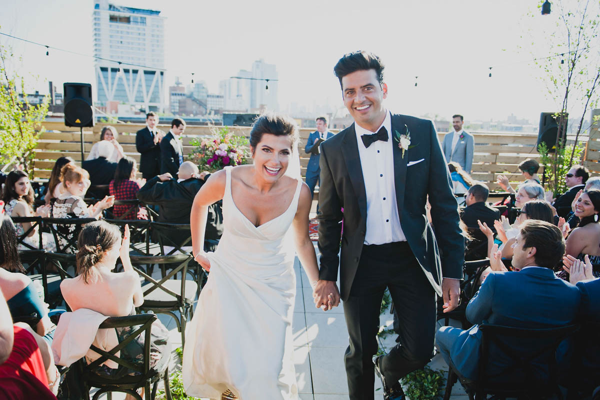 Beautiful Bride and Groom at a roof top wedding at Dobbin Street in Brooklyn